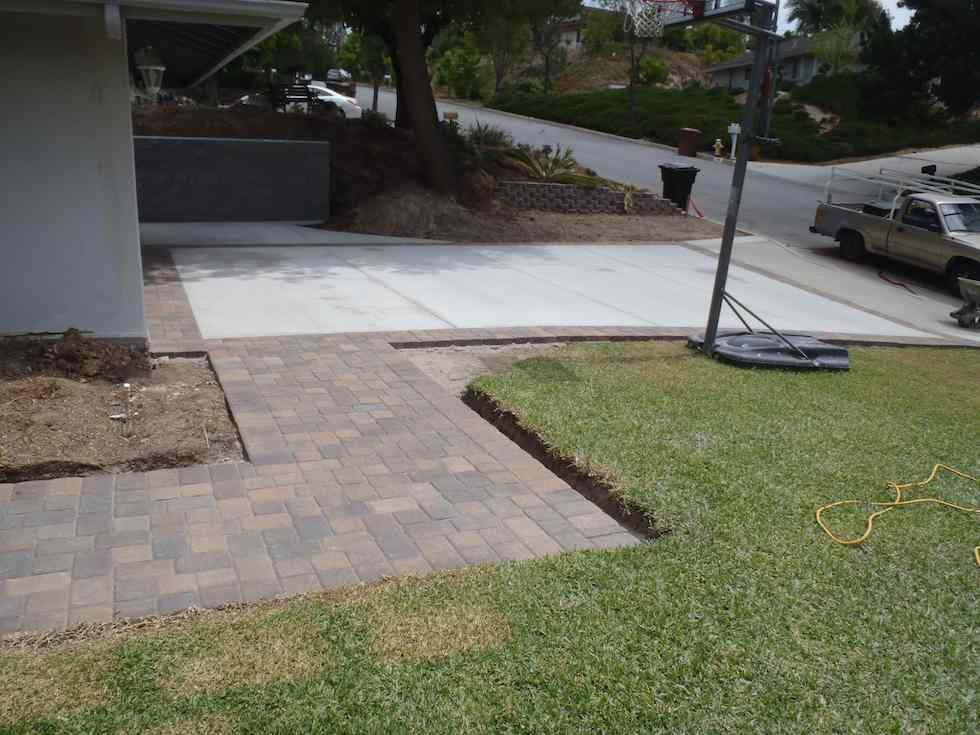 Paver walkway with brick edging, built by Driveway Masters